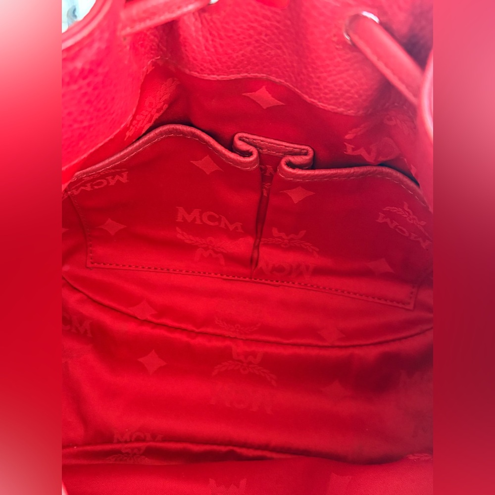 MCM Red Leather Bucket Bag
Crossbody Drawstring Gold Hardware - Picture 13 of 17